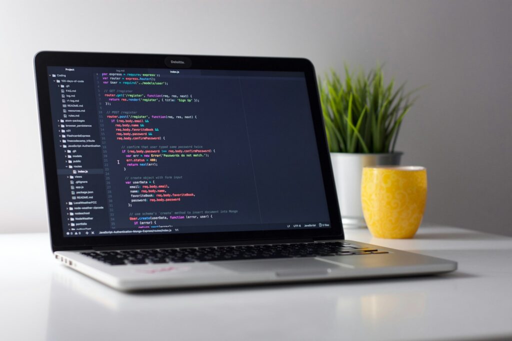 Laptop with code editor open